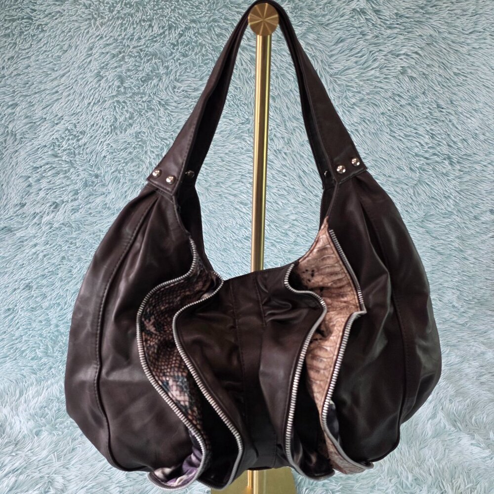 The Many Moods of Poppie Jones Black Faux Leather Purple Lining Studded Hobo Bag
